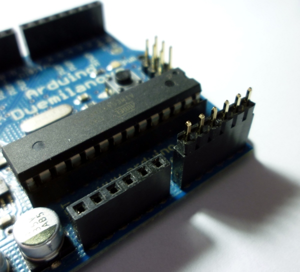 Header pins in arduino socket