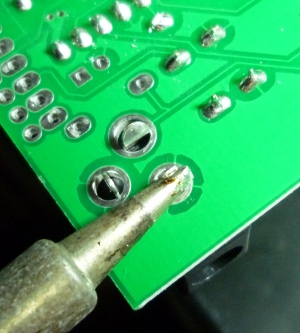 Make good contact between iron and board and lead to make the soldering easier