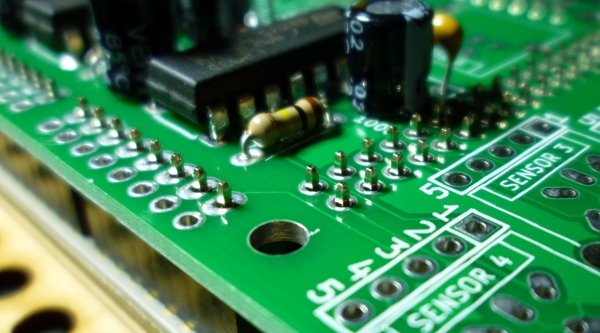 Put PCB over short ends of pins, solder.