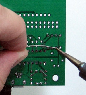 Solder chip in place